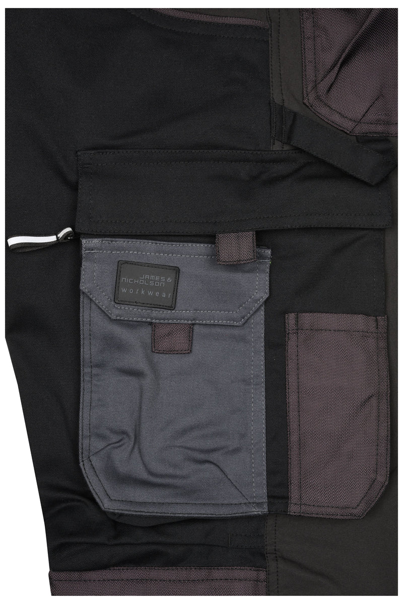 Laden Sie das Bild in Galerie -Viewer, Arbeitshose in schmaler Schnittführung mit elastischen Einsätzen und funktionellen Details - JN1812