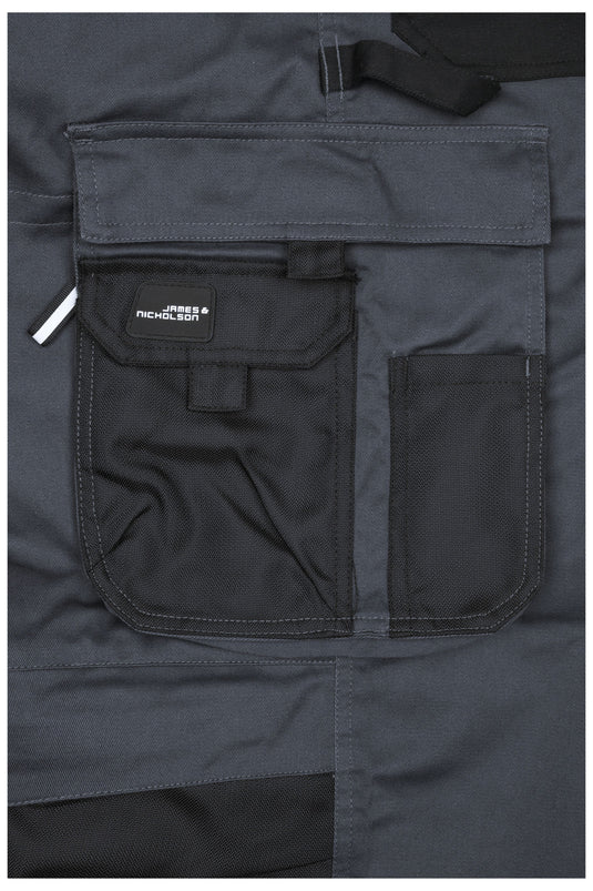 Spezialisierte Latzhose mit funktionellen Details und flexibel einstellbarem, elastischen Bund - JN1833